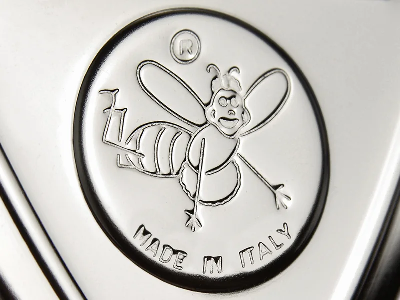 The APEX bee, embossed with “Made in Italy”